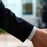 Two business people shaking hands